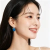 Blue cat's eye stud earrings, a fashionable, light luxury, niche and unique design with a cross-shaped high-end feel, are the latest trend in 2026 Specification image
